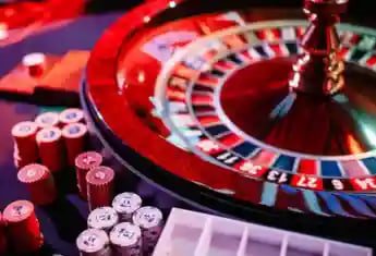 Filipino player watching live dealer baccarat on mobile browser